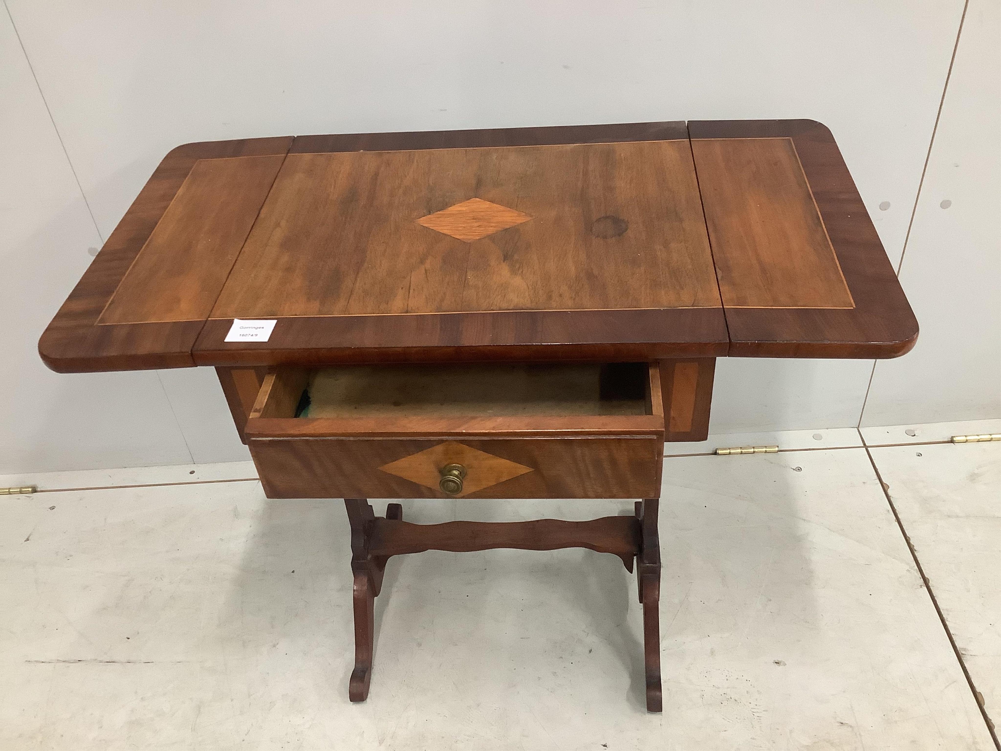 An inlaid mahogany drop flap occasional table, width 52cm, height 69cm. Condition - fair